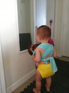 Checking herself out in the mirror. These generic diapers were actually some of my favorites. 